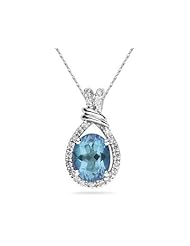 Oval Shaped Blue Topaz and Diamonds Pendant in White Gold