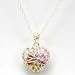 T.O.C. Presents A Caged Heart With Floating Coloured Stones On An 18" Sterling Silver Chain