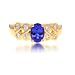 18k Yellow Gold Oval Tanzanite and Round Diamond Ring, Size 7