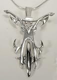 A Female Biker in Sterling Silver...Look Closely...Why Be Ordinary?