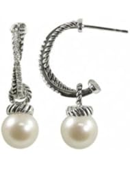 Sterling silver oxidized 9-10mm freshwater cultured pearl and diamond (.219ctw) earrings.