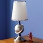 Our Saturn Lamp has brushed-steel planet and base and whip stitched shade detail.