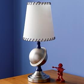 Our Saturn Lamp has brushed-steel planet and base and whip stitched shade detail.