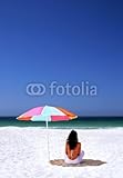 IMAGE OF Wallmonkeys Peel and Stick Wall Decals - Woman Sitting on Spanish Beach under Sun Umbrella. White Sand Bl - 60