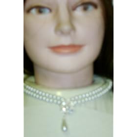 Click here to buy Light Ivory Simulated Pearls Christina Collection Short Chain Necklace with Embedded Crystals... by Gita.