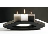 Coloured cube candles on black wooden holder