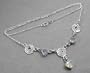 Silver Faceted Rainbow Moonstone and Spirals Necklace
