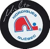 Michel Goulet Autographed/Hand Signed Hockey Puck (Quebec Nordiques)