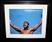 Signed Ali, Muhammad 16x20 "Limited Edition" A gorgeous 20"x16" photograph nicely signed in blue marker by Muhammad Ali. This photograph was signed at private autograph session in 2003. (the exact date will be given to the purchaser). The photograph is number 4 from a numbered limited edition of only 50 photographs signed. Ali and his family announced in 2006 that he would no longer do any autogra