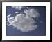 A Deep Blue Sky with Bright Fluffy White Clouds Framed Art Poster Print, 31x25