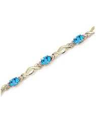 14K Yellow Gold Oval Blue Topaz and Diamond Bracelet by Jewelry Mountain