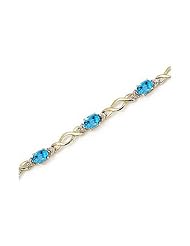 10K Yellow Gold Oval Blue Topaz and Diamond Bracelet