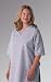 [Item]: 51" length, 62" sweep [Additional Info]: Demure Cloth Patient Robe. This good looking, functional patient robe, pictured at right, features an attached self-material belt and two roomy pockets. Made from our popular blue demure cloth, 4.1 oz/sq