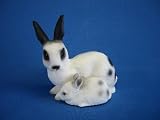Eigenschaften JS GartenDeko e.K.  / Deko Hase weiss mit Jungen Höhe 21 cm Figur aus Kunststoff
