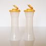 Tupperware Large Hourglass Salt & Pepper Shakers. Golden Seals