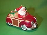 AUTOGRAPHED BY THE HALLMARK ORNAMENT WHO DESIGN IT HERE COMES SANTA SANTA'S WOOD 9TH IN THE SERIES 1987 hallmark ornament