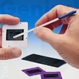 Kinetronics SpeckGRABBER - tool for capturing dust and dirt & cleaning optics, plastics & CCDs