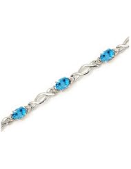 10K White Gold Oval Blue Topaz and Diamond Bracelet by Jewelry Mountain