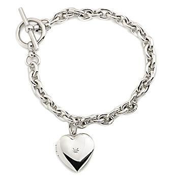 Child\'s Sterling Silver Locket Charm Bracelet. 7.5\