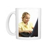 Girl using a laptop computer Photo Mugs