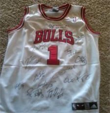 Signed 2010-2011 Chicago Bulls Team-Signed Jersey (Derrick Rose) Chicago Bulls Team Jersey: by: Derrick Rose , Carlos Boozer, Keith Bogans, Luol Deng, Joakim Noah, Ronnie Brewer, Taj Gibson, Kyle Korver, Brian Scalabrine, CJ Watson, Kurt Thomas, Tom Thibodeau.