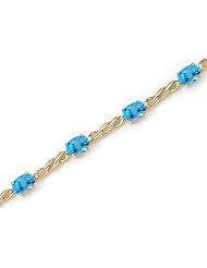 14K Yellow Gold Oval Blue Topaz Bracelet