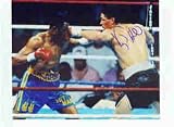 VIRGIL HILL AUTOGRAPHED 8X10 BOXING PHOTO VS TOMMY HEARNS (BOXING)