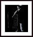 John Coltrane by David Redfern 19.62X27.50 Framed with Black Wood Frame