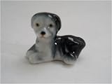 Dolls House Minatures Black and white porcelain dog lying down l