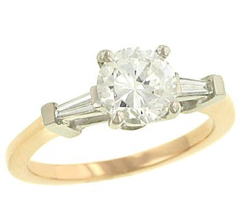 Ladies 3 Stone Mounting For Round Center and 2-0.17cttw Diamonds Side Baguettes (Center Stone Not Included)