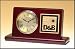 Personalized Rosewood stained piano finish, gold waterfall bezel, diamond-spun dial, three hand movement.