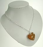 Review   / Womens heart pendant on a long silver coloured chain