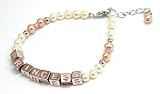 Image of Base Metal Simulated Pearl Kiddies Bracelet With Pink Enamelled Princess Cubes