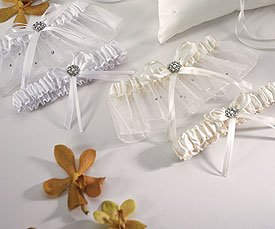 Click here to buy Scattered Pearls and Crystals Two Piece Bridal Garter Set - Ivory - Keepsake and Toss Garter per... by SHOPZEUS.
