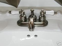 Banner Antique Brass Lav Faucet W/ Porc Lever Handles