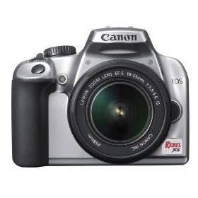 Canon Rebel XS 10.1MP Digital SLR Camera with EF-S 18-55mm f/3.5-5.6 IS Lens (Silver)