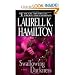 by Laurell K. Hamilton Swallowing Darkness, A Novel (Meredith Gentry Novels) Reprint edition