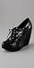 Tapeet Lace Up Wedge Ankle Bootie