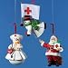 AMERICAN RED CROSS ORNAMENT - 3.75-4" FULL ROUND RESIN AMERICAN RED CROSS ORNAMENT 3/ASSTD: SANTA, FLYING SNOWMAN & SNOWNURSE.