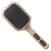 Maxi taming Phine Pin, cushioned pad brush with beech wood handle and rubber inserts. A medium paddle for medium to long hair. De-tangles and tames. The air cushioned head massage the scalp.