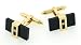 Dramatic 18kt yellow gold cufflinks with onyx and diamond
