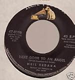 Next Door to an Angel / I Belong to You