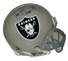 Tim Brown Autographed/Hand Signed Oakland Raiders Pro Line Helmet by Riddell