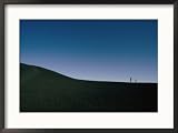 Tourists walking along a lava field in Craters of the Moon National Park Places Framed Art Poster Print by Randy Olson, 29x21