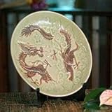 IMAGE OF NOVICA Celadon ceramic plate, 'Dragon Journeys'