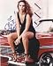 Elizabeth Berkley autographed 8x10 Photo (car pose) Saved by the Bell Star