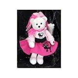 22" Olivia Singing Teddy Bear in pink poodle skirt