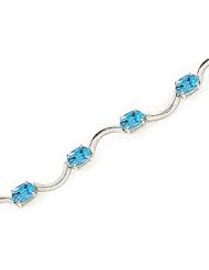 14kt Yellow Gold Oval Blue Topaz Bracelet.