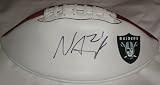 Nnamdi Asomugha Autographed Oakland Raiders Logo Football W/PROOF, Picture of Nnamdi Signing For Us.