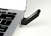 NuForce uTX Transmitter connects to computer USB port for wireless USB audio streaming